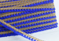 Passamaneria frangia con bordo oro