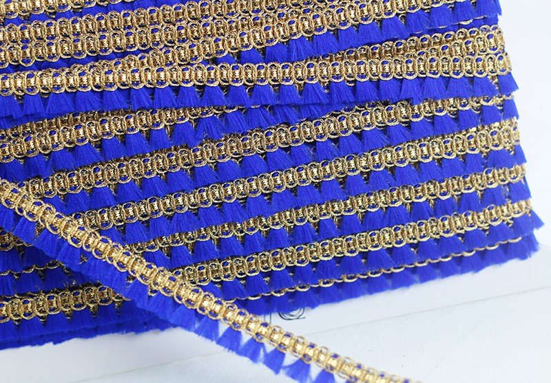 Passamaneria frangia con bordo oro