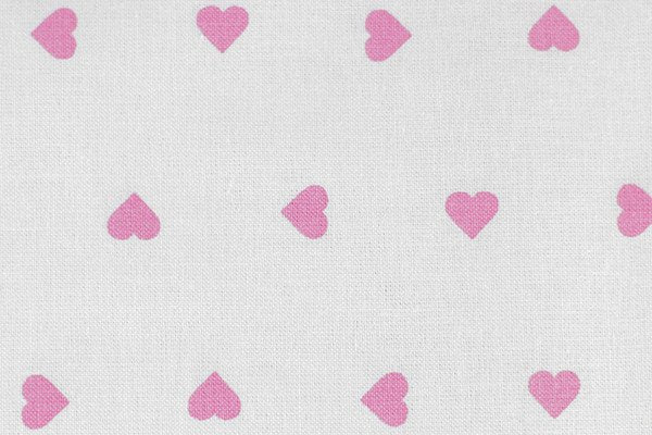 Tessuto Cotone fantasia Cuori su base panna