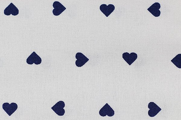 Tessuto Cotone fantasia Cuori su base panna