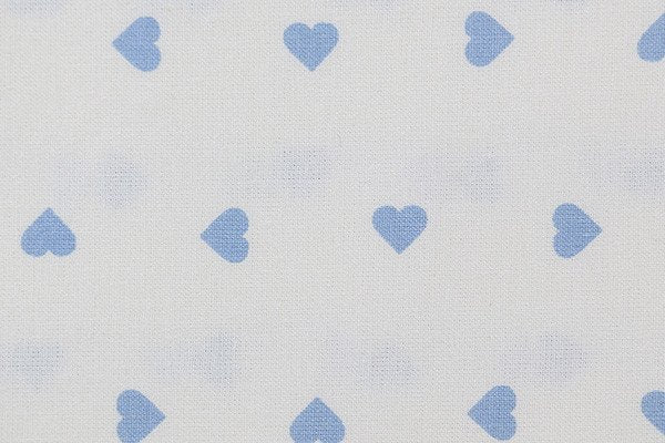 Tessuto Cotone fantasia Cuori su base panna