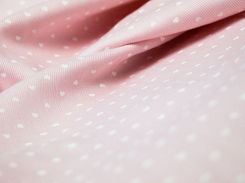 Tessuto baby in rigatino con cuori