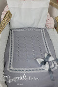 Copertina per cesta in lana con fiocco