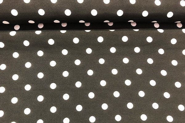 Tessuto in maglia con pois grandi