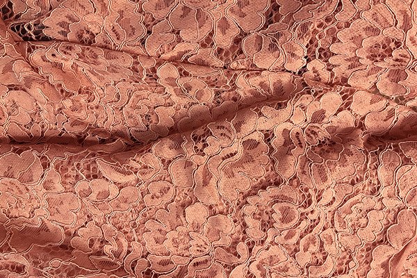 Tessuto in pizzo macramè rosa scuro
