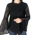 Maglia in pizzo con maniche ampie