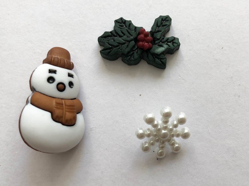 Bottoni natalizi pupazzo e fiocchi di neve