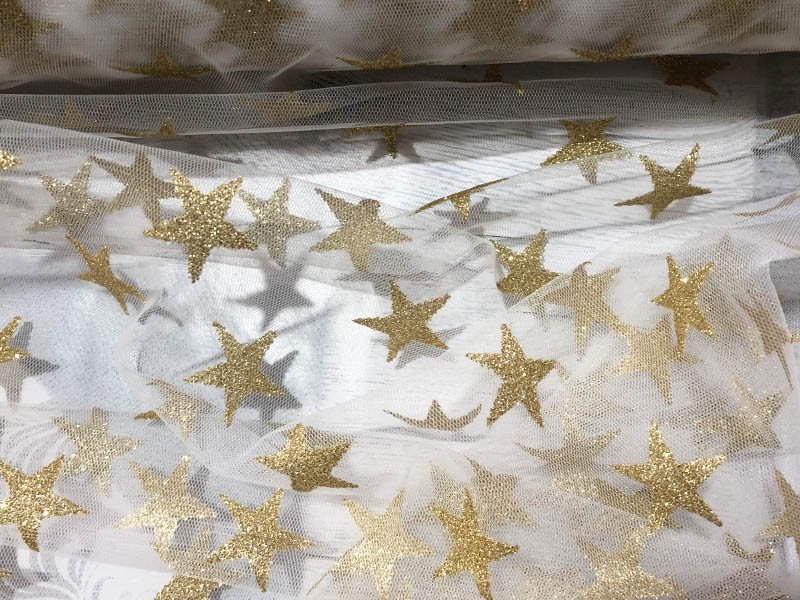 Tessuto in tulle goldstar lurex oro