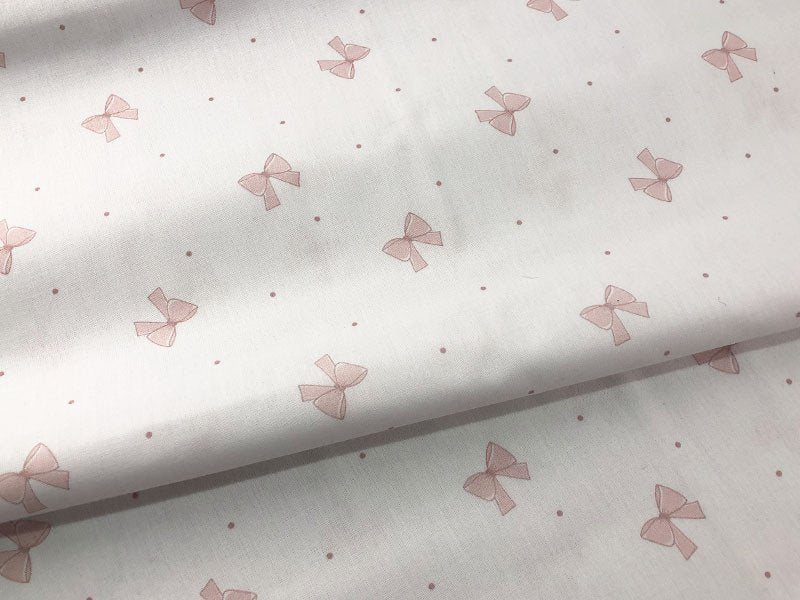 Tessuito cotone fiocchi e pois