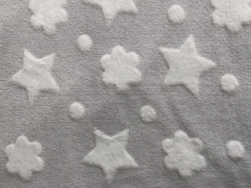 Tessuto baby in pile coral Luna/stelle e pois