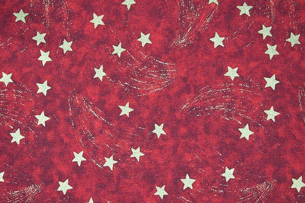 Tessuto Natalizio rosso con stelle oro
