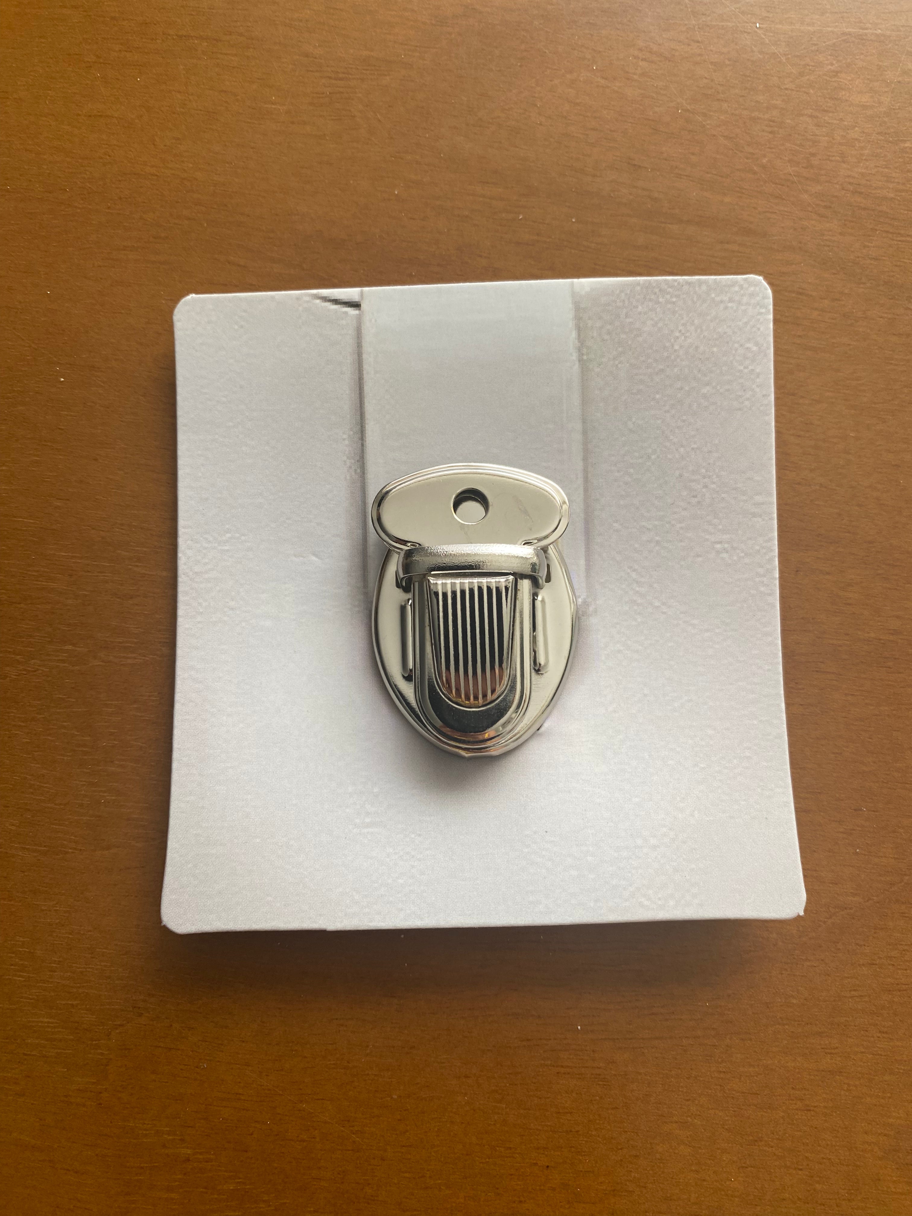 Chiusura per borsa ovalizzata da 3 cm